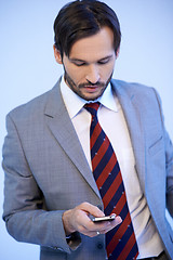 Image showing Businessman making a mobile phone call