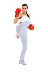 Image showing Full body shot of female kick boxer