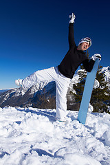 Image showing Female Snowboarder in Dolomites