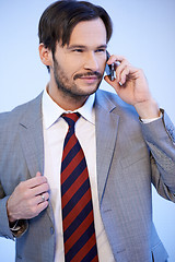 Image showing Businessman chatting on a mobile phone