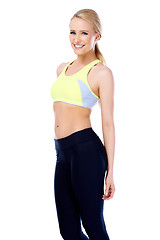 Image showing Fitness blond girl smiling