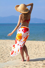 Image showing Young sexy woman standing at the beach