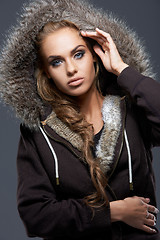 Image showing Close up of blond woman wearing hooded sweatshirt