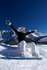 Image showing Female Snowboarder in Dolomites