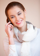 Image showing Brunette woman talking mobile phone