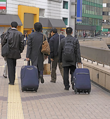 Image showing Businessmen travellers group