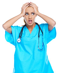 Image showing Distressed doctor holding her head