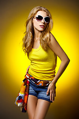 Image showing Sexy woman on Yellow