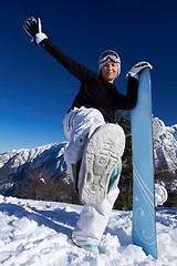 Image showing Female Snowboarder in Dolomites