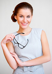 Image showing Young attractive business woman with glasses