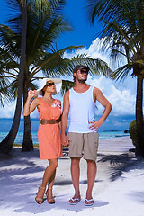 Image showing Couple nex to Palm tree