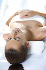 Image showing Beautiful woman is resting on spa bed