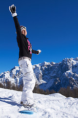 Image showing Female Snowboarder in Dolomites