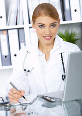 Image showing Female doctor in surgery