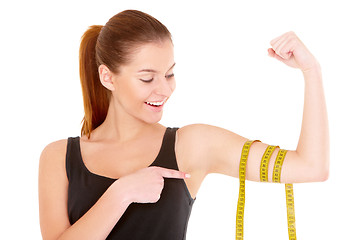 Image showing Fitness woman with measure tape