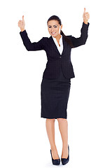 Image showing Business woman standing and showing thumbs up gesture