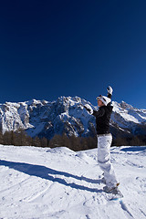 Image showing Female Snowboarder in Dolomites