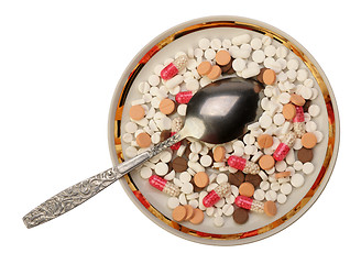 Image showing Pills on the saucer