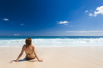 Image showing Sitting on the beach