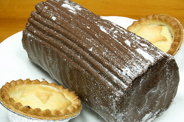 Image showing yulelog and fruit pies