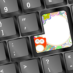 Image showing owl and flowers on computer keyboard key