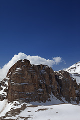 Image showing Rocks in snow and blue sky