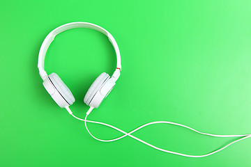 Image showing Headphone on green background 