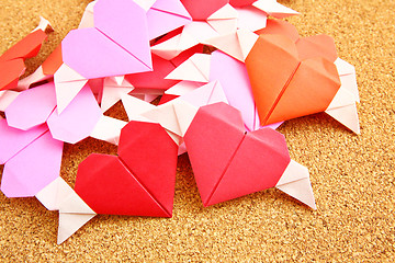 Image showing Origami colorful heart on corkboard 