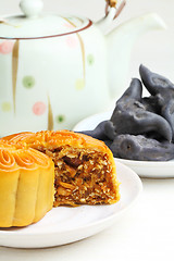 Image showing Moon cake with tea and water caltrop