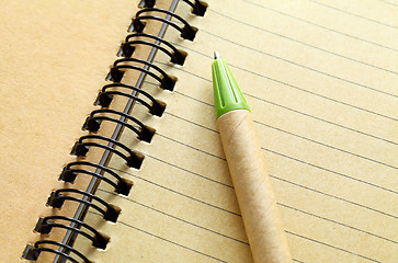 Image showing spiral notebook with pen