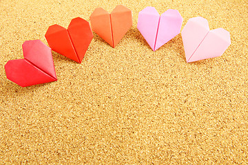 Image showing Origami colorful heart on corkboard 