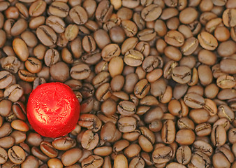 Image showing Red chocolate on coffee
