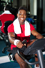 Image showing Fit man training in a fitness club