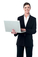 Image showing Middle aged professional woman with laptop