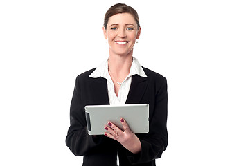 Image showing Cheerful business manager holding touch pad