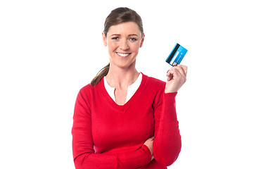 Image showing Pretty lady showing her cash card