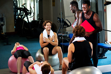 Image showing Group of people in a pilates class