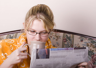 Image showing Morning news with coffee
