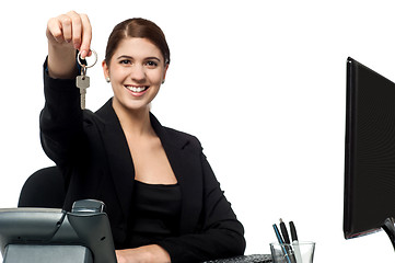 Image showing Female secretary offering you cabin key