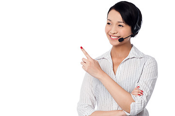 Image showing Customer support staff pointing away