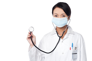 Image showing Female physician posing with stethoscope