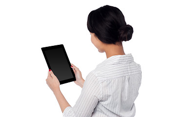 Image showing Business woman operating touch pad device