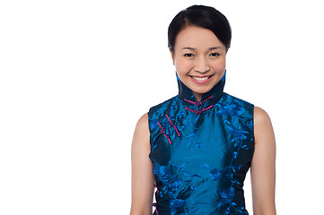 Image showing Young attractive chinese woman in blue dress