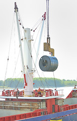 Image showing Rolls of steel sheet in the harbor 