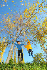 Image showing boys jumping