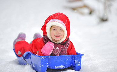 Image showing Little girl on sleigh 