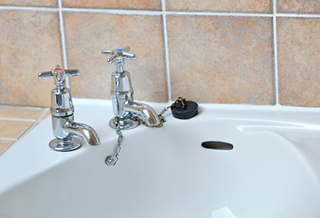 Image showing old irish mixer taps