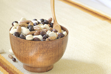 Image showing colored beans in wooden bowl