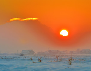 Image showing sunset over village