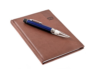 Image showing Notebook with blue pen
